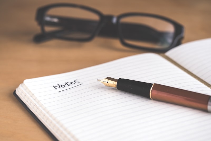 A magnifying glass over text suggesting detailed analysis