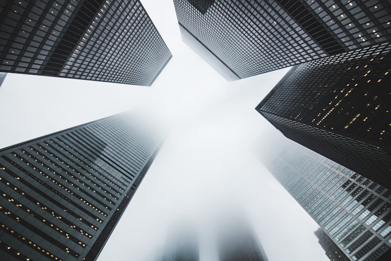 City towers with sharp angles and geometric lines against the sky