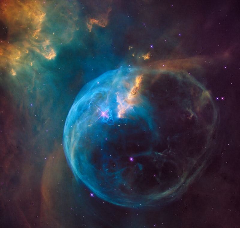 A vast colorful nebula with intricate structure emerging from chaos