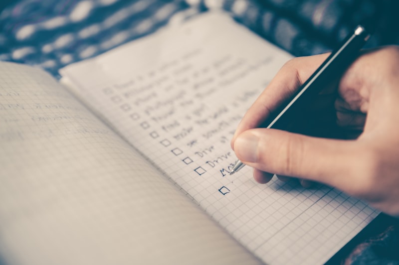A notebook or planner with organized writing and checklists